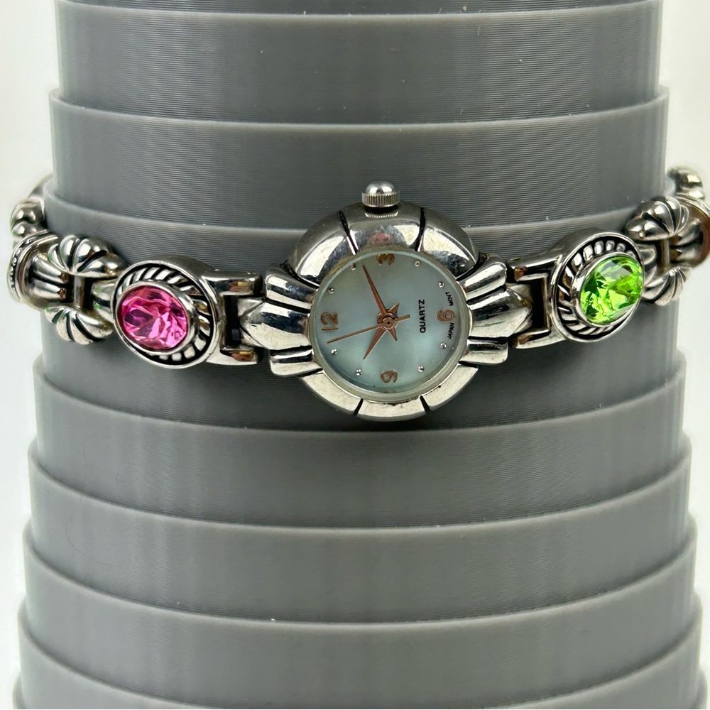 Elegant Silver Tone Quartz watch with Pink, Green, Gold and Blue Accents